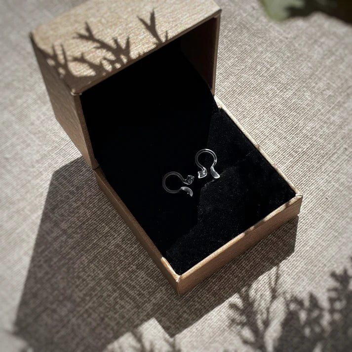 Pince correctrice d'oreilles